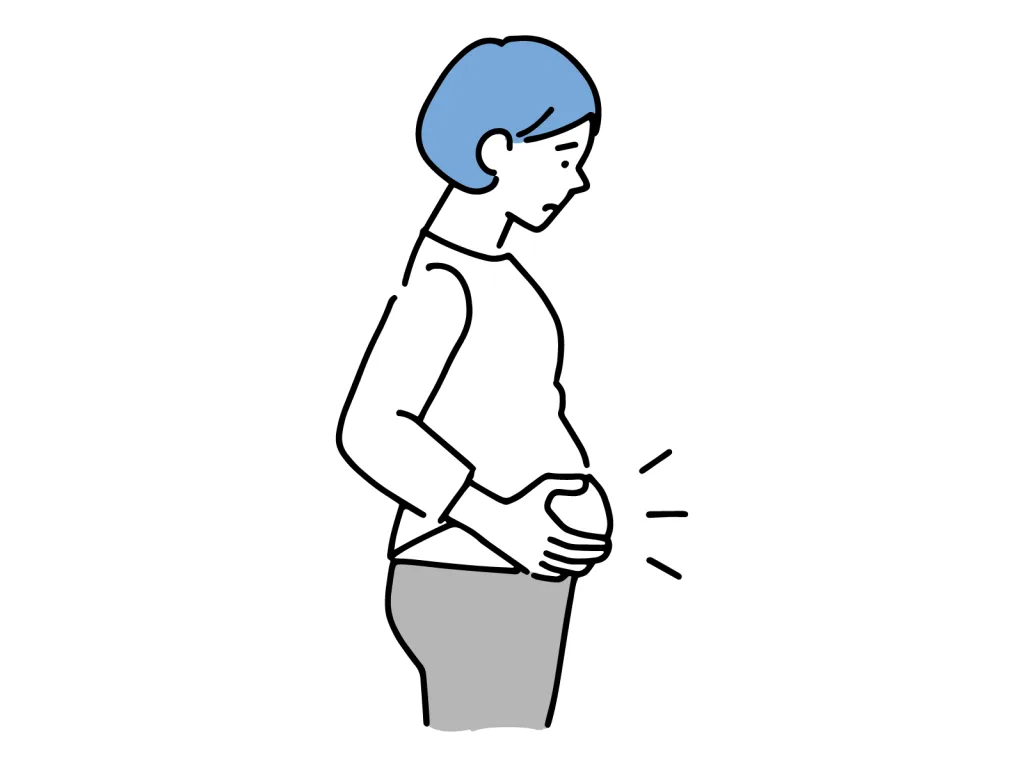 お腹を気にする女性