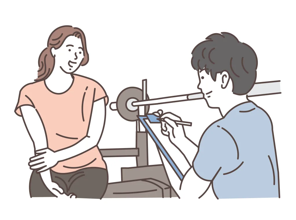 23841258 | 外苑前のパーソナルジム|QUALITAS青山外苑前店 ジムトレーナーがカウンセリングを受けている様子