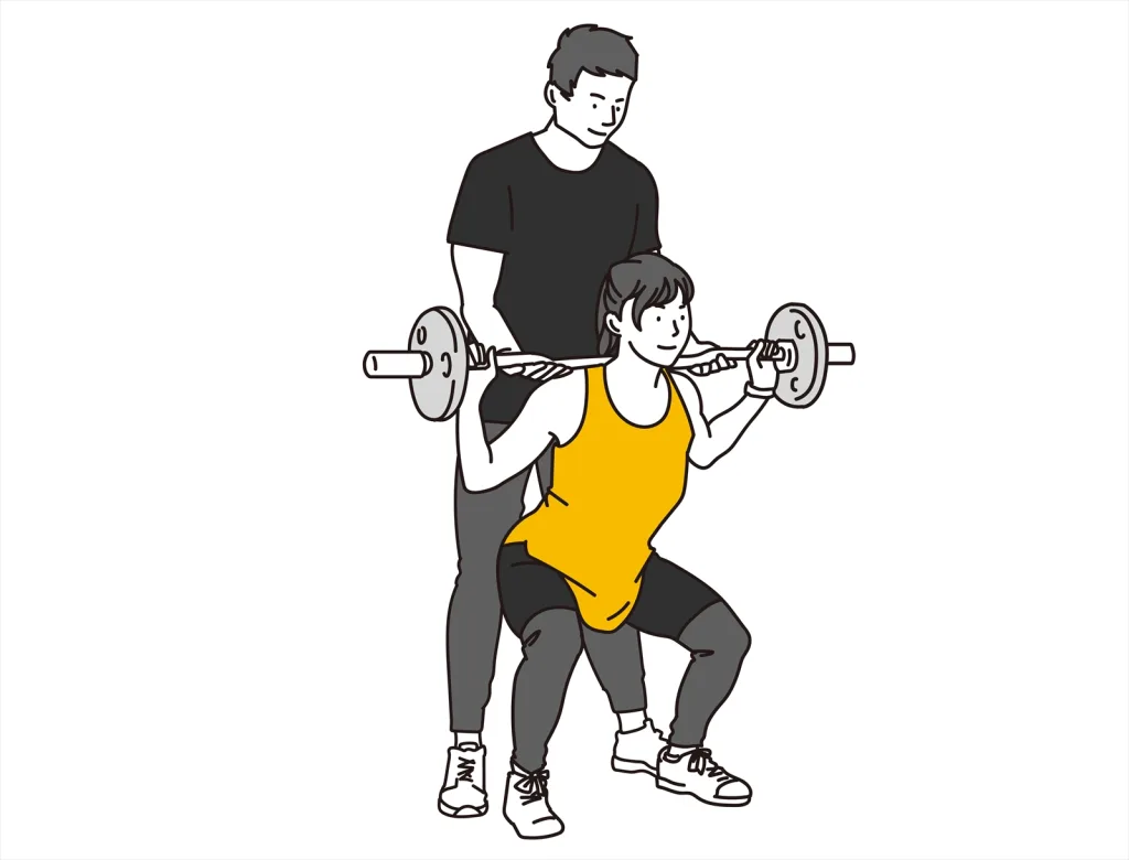 男性トレーナーとトレーニングする女性