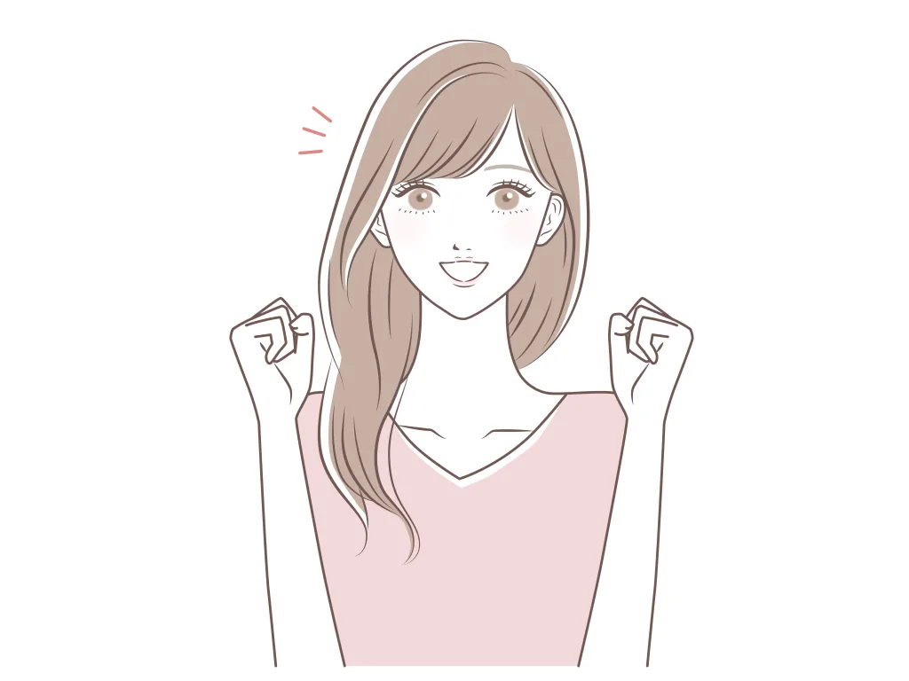 ガッツポーズする女の人