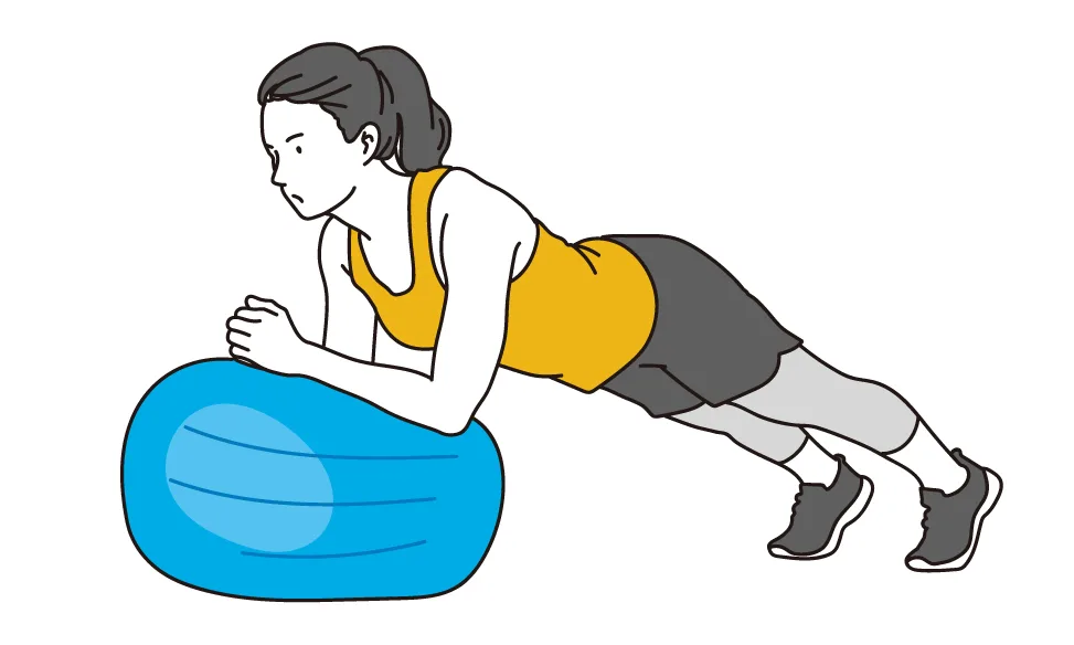 バランスボールで筋トレしてる女性